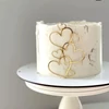Kép 3/3 - Arany színű szív tortadekoráció, 7 db